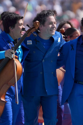 Gustavo Dudamel and his musicians at the World Cup Final in the blue BARABAS Palma Pinstripe Suit, made by the independent Los Angeles menswear brand. Gustavo Dudamel and his musicians at the World Cup Final in the blue BARABAS Palma Pinstripe Suit, made by the independent Los Angeles menswear brand.